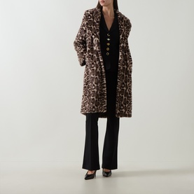 Model wearing Joseph Ribkoff Leopard Print Faux Fur Coat in beige/multi, longline with notch lapels, styled with black flared trousers and heels.