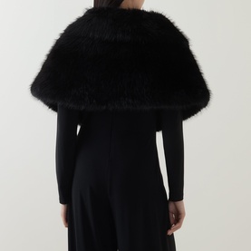 Model wearing Joseph Ribkoff Faux-Fur Collar Stole in black, shown from behind over a black dress, with voluminous faux-fur texture