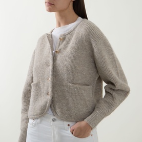 Model wearing Joseph Ribkoff Rib-Knit Cardigan in Oatmeal Melange, round neck, button front, styled with white tee and jeans.