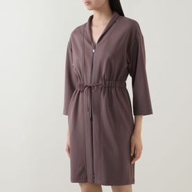 Model wearing a dusty mauve zip-front robe with drawstring waist and three-quarter sleeves