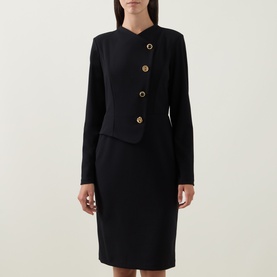Model wearing Joseph Ribkoff Statement Button Pencil Dress in black with asymmetric gold button fastening, high neckline, long sleeves, midi length
