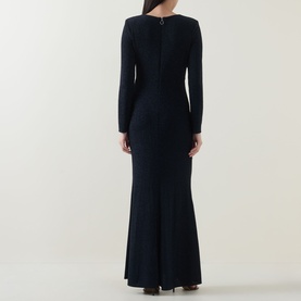 Model wearing Joseph Ribkoff Metallic Wrap Gown Dress in navy, back view showing long sleeves, maxi length, and fitted silhouette with slit hem.