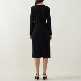 Model wearing Joseph Ribkoff black long-sleeve midi dress, back view, shown with black heeled mules.