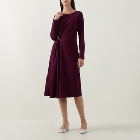 Model wearing Joseph Ribkoff Gathered Hardware-Detail Dress in Elderberry, long sleeves, side-gathered waist, midi flared skirt, styled with cream