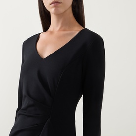 Model wearing Joseph Ribkoff Frill-Detail Layered Ruffle Dress in black, showing V-neckline and long sleeves with wrap-style bodice detail
