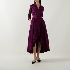 Model wearing Joseph Ribkoff Double-Breasted Blazer Dress in Berry Burst, flared high-low midi hem, self-tie belt, styled with black heels