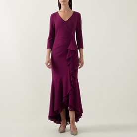Model wearing Joseph Ribkoff Berry Burst maxi dress with V-neckline, 3/4 sleeves, and cascading ruffle front detail.