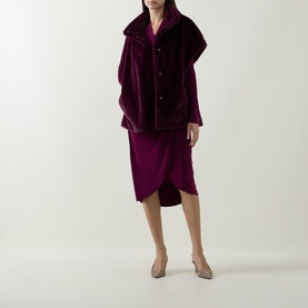 Model wearing Joseph Ribkoff Berry Burst dress in berry purple, styled with matching velvet jacket and nude heels.