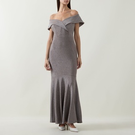 Model wearing Joseph Ribkoff Off-The-Shoulder Mermaid Dress in taupe lurex, fitted silhouette with flared mermaid skirt, maxi length