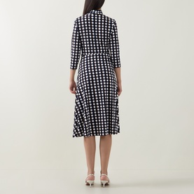Model wearing Joseph Ribkoff Printed Wrap Dress in Brown/Multi polka dot print, back view, flared midi skirt, three-quarter sleeves, styled with