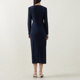 Model wearing Joseph Ribkoff Draped Cinched Dress in Midnight Blue, long sleeves, midi length with back view showing draped silhouette and front slit.