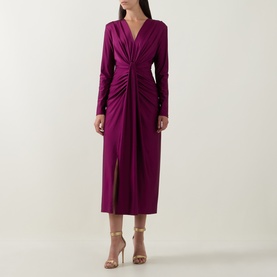 Model wearing Joseph Ribkoff Draped Cinched Dress in Berry Burst, featuring V-neck, twisted front, gathered detail and front slit midi length