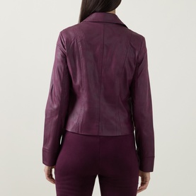 Model wearing Joseph Ribkoff Studded Faux Leather Jacket in Elderberry, back view, styled with matching trousers