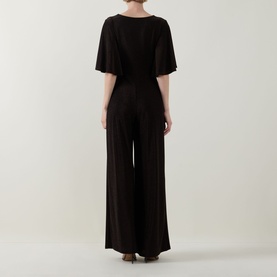 Model wearing Joseph Ribkoff bronze jumpsuit, rear view, flutter sleeves, wide-leg silhouette, belted waist