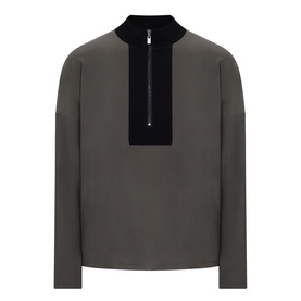 Joseph Ribkoff avocado and black long-sleeve top with velvet half-zip stand collar detail and contrast bib panel