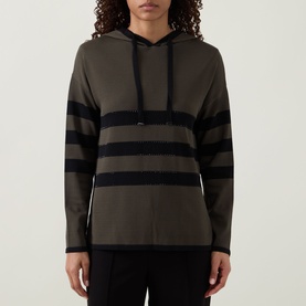 Model wearing Joseph Ribkoff Striped Hoodie in avocado and black, with bold horizontal stripes, hood, and long sleeves.