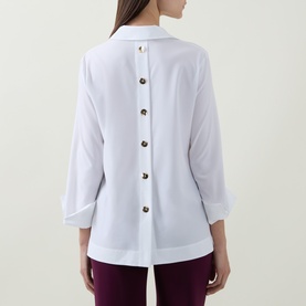 Model wearing Joseph Ribkoff vanilla top, rear view showing button-down back detail and three-quarter length sleeves