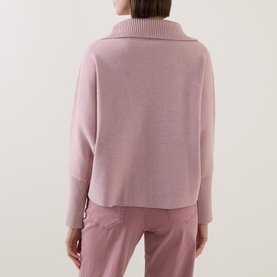 Model wearing Joseph Ribkoff Top in Soft Blush Melange, rear view, wide collar, relaxed fit, styled with matching blush trousers.