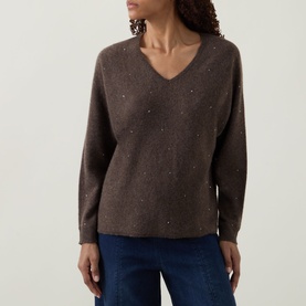 Model wearing Joseph Ribkoff Jewel Embellished Sweater in dark taupe melange, V-neck cashmere knit with scattered jewel embellishments, styled with