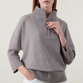 Model wearing Joseph Ribkoff Top in Taupe Melange, half-zip funnel neck, ribbed cuffs and hem, relaxed fit