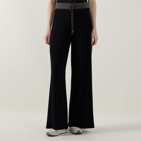 Model wearing Joseph Ribkoff Black/Avocado wide-leg trousers with contrast drawstring waistband in stretch fabric.
