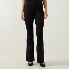 Model wearing Joseph Ribkoff Velour Flared-Leg Trousers in black, mid-rise pull-on style with pressed creases and clean flared hems
