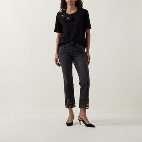 Model wearing Joseph Ribkoff Rhinestone Hem Jeans in charcoal grey, cropped skinny fit with rhinestone trim hem, styled with black tee and slingback