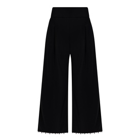 Joseph Ribkoff Beaded Wide Leg Culottes Trousers in black with elasticated waistband, front pleats, and faux pearl beaded hem detail.
