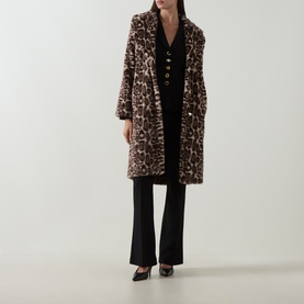 Model wearing Joseph Ribkoff black wide-leg trousers, styled with a leopard print faux fur coat and black heels.