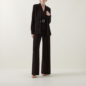 Model wearing Joseph Ribkoff bronze wide-leg trousers styled with a matching belted blazer and nude heels.