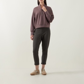 Model wearing Joseph Ribkoff Drawstring Cropped Sweatpants in Avocado, straight-leg with elasticated waist, styled with a mauve half-zip sweatshirt.