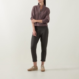 Model wearing Joseph Ribkoff Drawstring Cropped Sweatpants in Avocado, straight-leg fit with elasticated waist, styled with a mauve top and beige