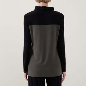 Model wearing Joseph Ribkoff Tunic in Avocado/Black, rear view showing colour-block back panel with long sleeves and mock neck.