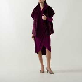 Model wearing Joseph Ribkoff Elderberry vest styled over matching wrap dress, with nude heeled mules.