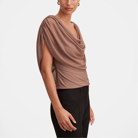 Model wearing Forever New Portobello draped cowl-neck top with split sleeves, styled with black trousers