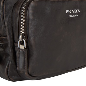 Prada Bandoliera Logo Messenger Bag in brown distressed nappa leather, silver-tone zip fastening and Prada Milano logo lettering detail