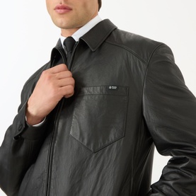 Model wearing Prada black nappa leather casual jacket, zip fastening with chest pocket detail, styled with white shirt and tie
