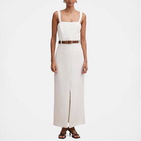 Model wearing Forever New porcelain maxi dress with square neckline, front split and pockets, styled with a brown belt and strappy sandals.