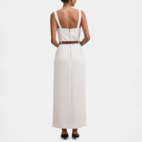 Model wearing Forever New porcelain midi dress with square neckline crop top bodice, back view, styled with tan belt.