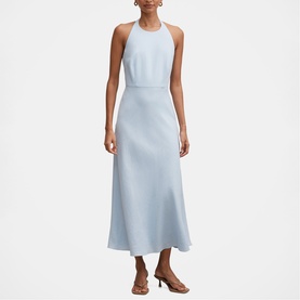 Model wearing Forever New Bluebell halterneck midi dress with open back, styled with tan heeled sandals