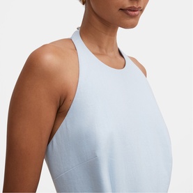 Model wearing Forever New top in Bluebell, close-up of racerback neckline and sleeveless silhouette in soft knit fabric.