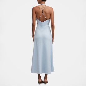 Model wearing Forever New Bluebell midi dress with open back, halter neck strapping detail, shown from behind with brown heeled mules.