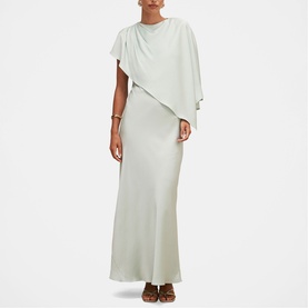 Model wearing Forever New dusty aqua maxi dress with draped cape overlay, styled with brown strappy heeled sandals.