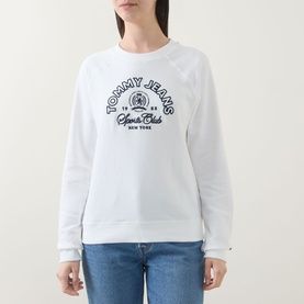 Model wearing Tommy Heritage Logo Sweatshirt in ecru with crew neck and contrast Heritage logo graphic, styled with blue jeans