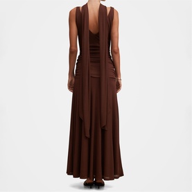 Model wearing Forever New Dark Mahogany maxi dress with draped scarf neckline, ruched bodice, and flared skirt, seen from the back.