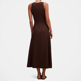 Model wearing dark brown sleeveless midi dress with fitted bodice, flared skirt, and scoop back detail