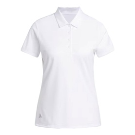 Model wearing Adidas Golf women's white short-sleeve polo shirt with three-button placket and small logo at hem