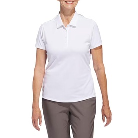 Model wearing Adidas Golf white short-sleeve polo shirt, styled with grey tapered trousers