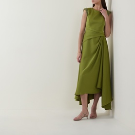 Model wearing Maisonel Beaded Drape Dress in Meadow, midi length with cap sleeves, gathered waist, draped detail and asymmetric hemline, styled with