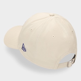 New Era beige cotton baseball cap, rear view showing navy logo flag and adjustable metal buckle strap